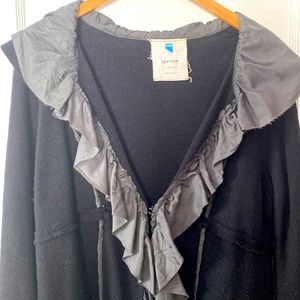 Long merino boucle wool cardigan with silk ruffle trim and contrast piping. VGUC